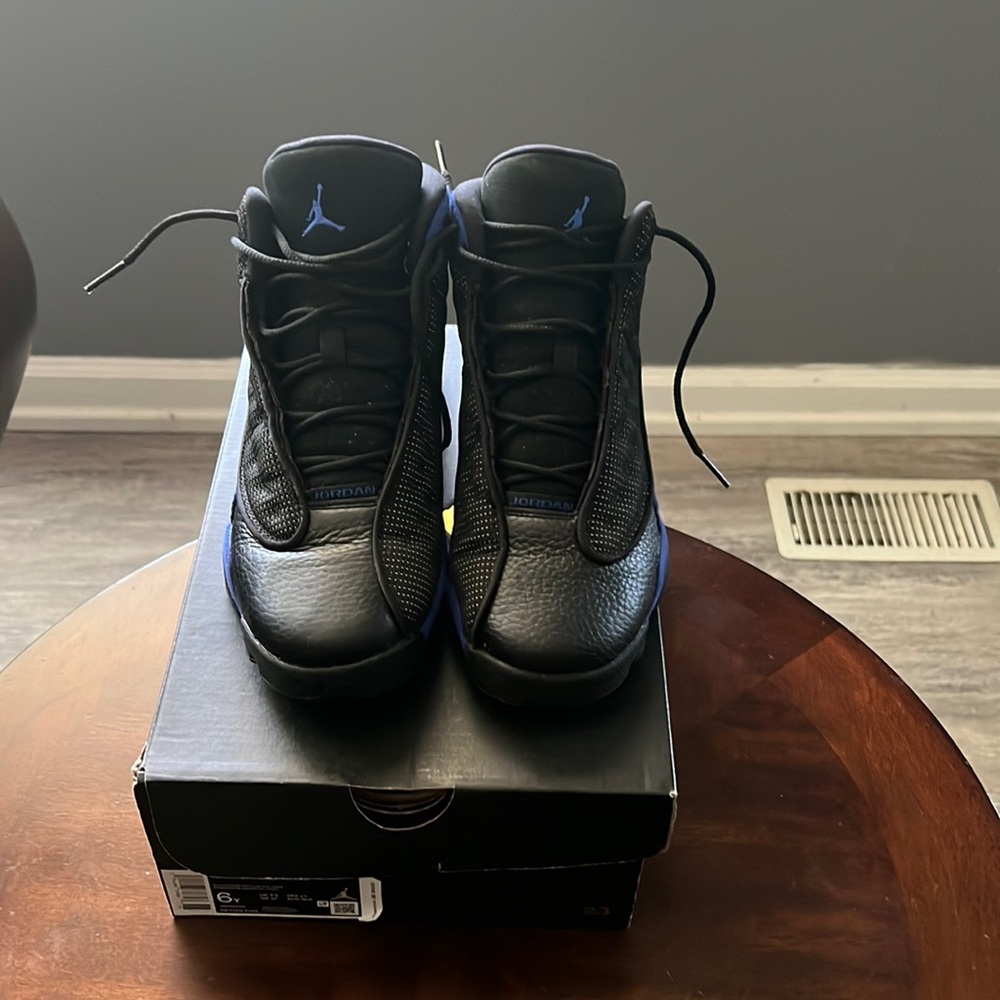 Grade School Jordan 13’s. Fits a size 7.5 in women’s.